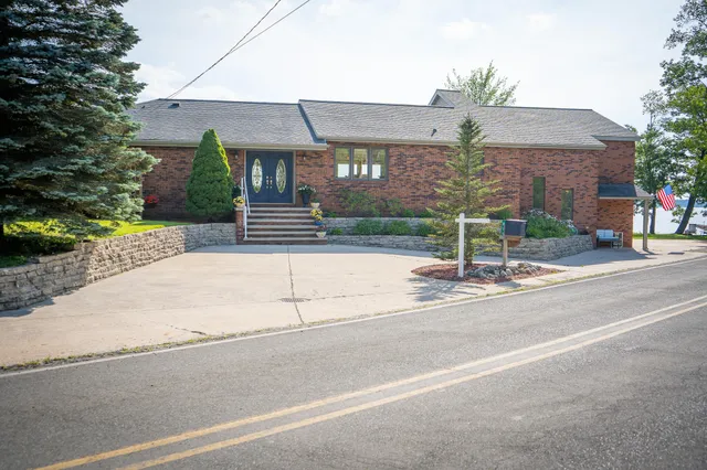 $1,200,000 | 815 East Lake Mitchell Drive, Cadillac, MI 49601