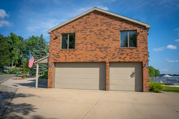 $1,200,000 | 815 East Lake Mitchell Drive, Cadillac, MI 49601