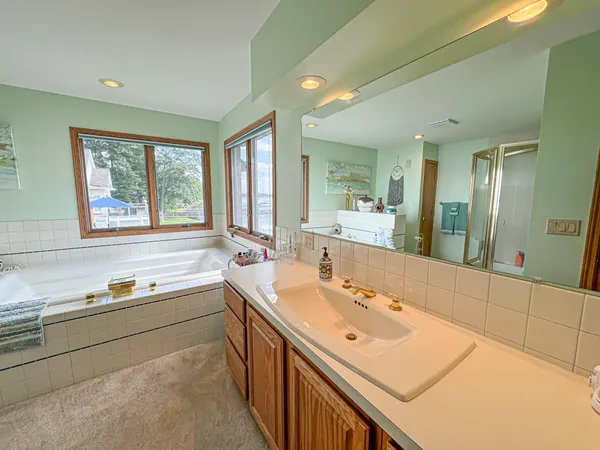 $1,200,000 | 815 East Lake Mitchell Drive, Cadillac, MI 49601