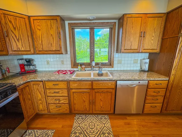 $1,200,000 | 815 East Lake Mitchell Drive, Cadillac, MI 49601