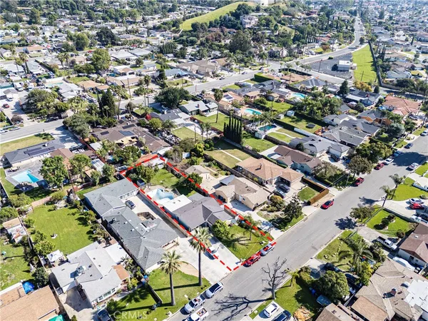 an aerial view of a city with lots of residential buildings