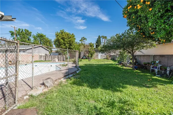 a view of a backyard with a garden