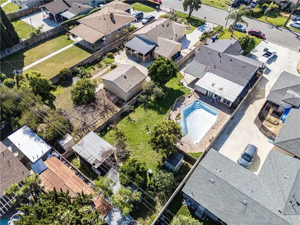 an aerial view of a house with a garden
