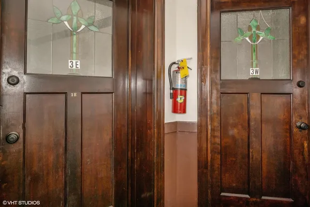 a bathroom with a shower and a sink