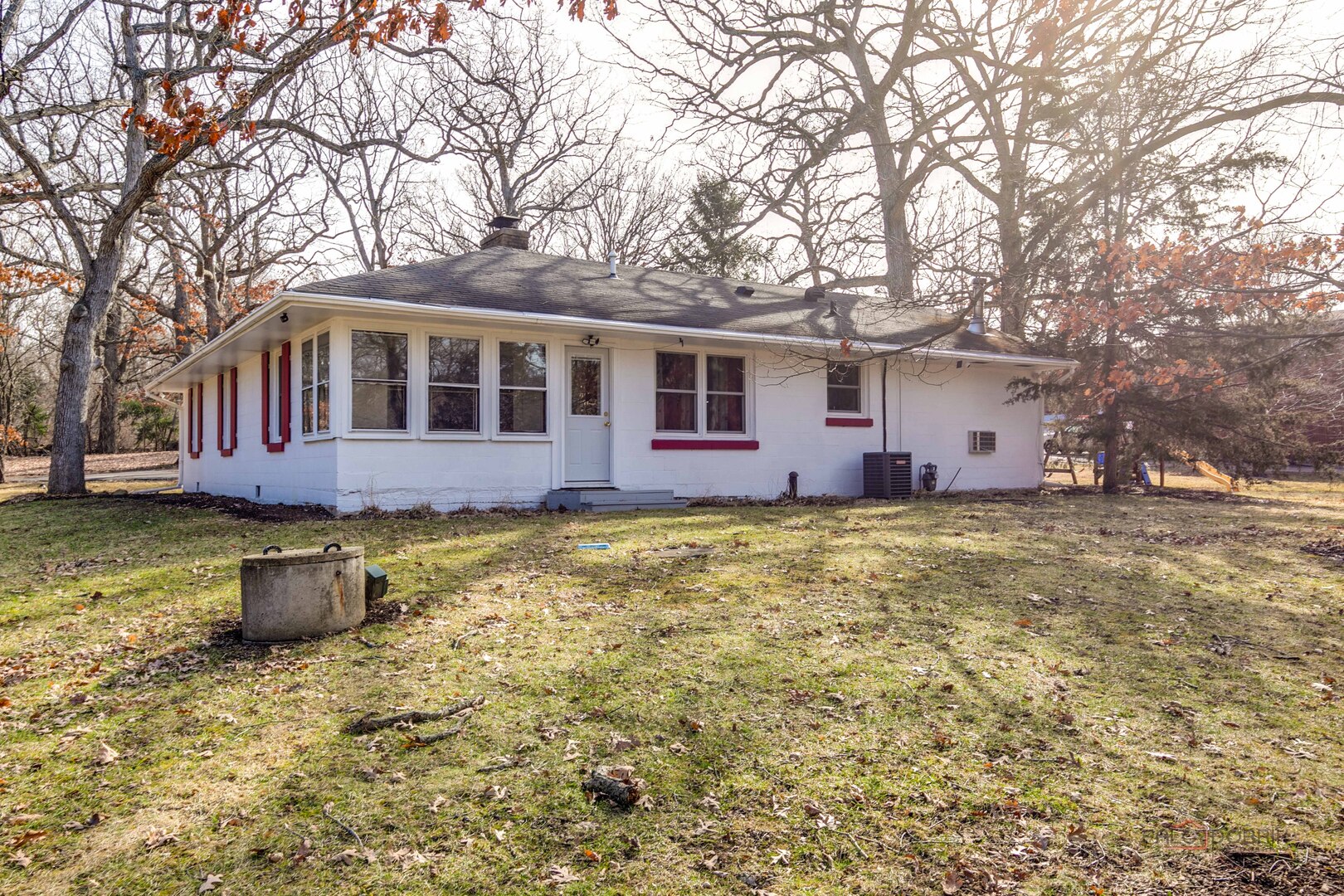 15983 West Wadsworth Road Wadsworth, IL 60083 - Photo 28 of 32 a front view of a house with a yard table and chairs