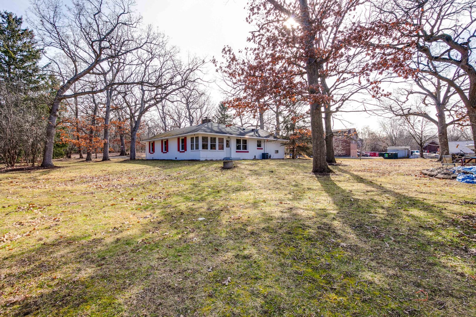 15983 West Wadsworth Road Wadsworth, IL 60083 - Photo 29 of 32 a view of a yard with a house and large trees