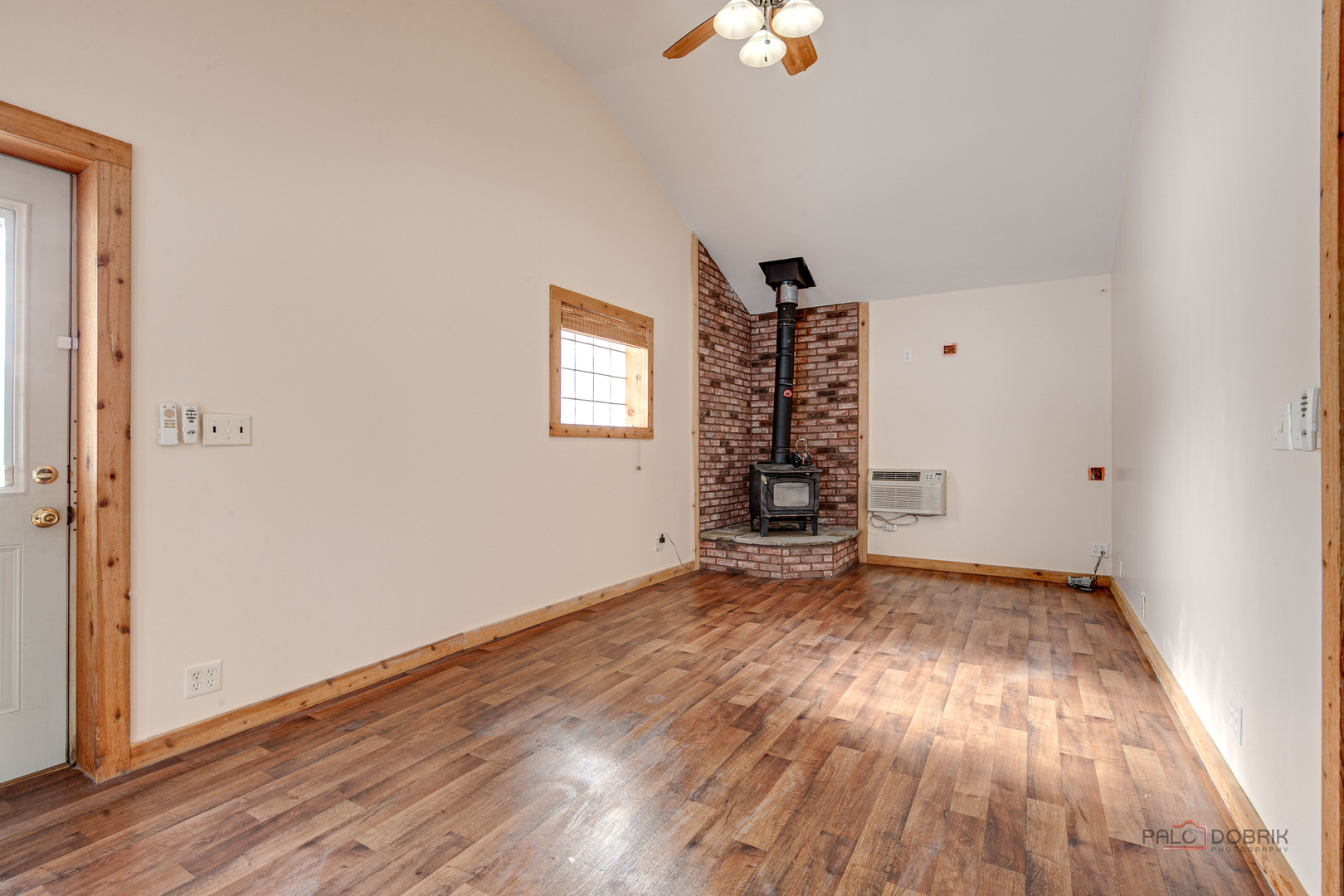 15983 West Wadsworth Road Wadsworth, IL 60083 - Photo 8 of 32 wooden floor in an empty room with a window