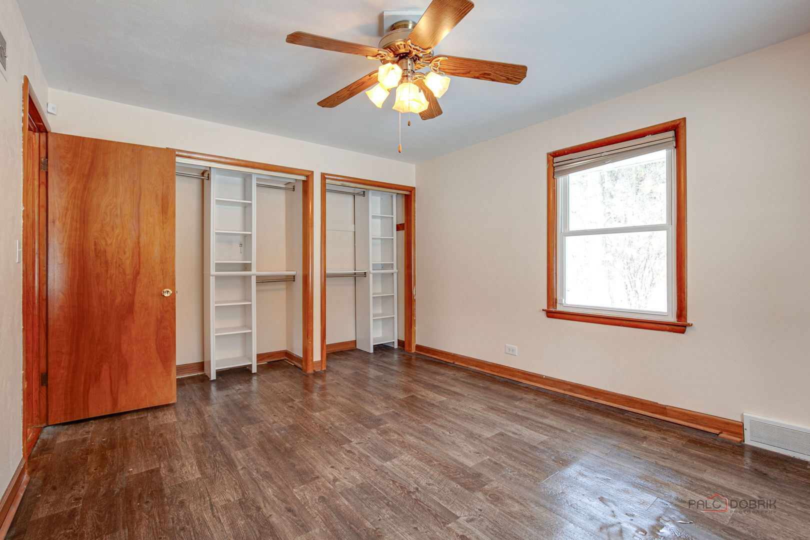 15983 West Wadsworth Road Wadsworth, IL 60083 - Photo 10 of 32 wooden floor in an empty room with a window