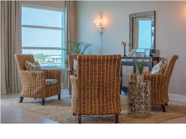 211 Durango Road, Unit 713 Destin, FL 32541 - Photo 11 of 30 a view of a dining room with furniture and chandelier