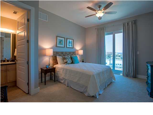211 Durango Road, Unit 713 Destin, FL 32541 - Photo 15 of 30 a living room with a bed furniture and a window