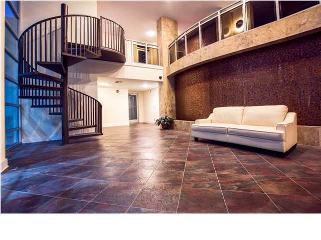 211 Durango Road, Unit 713 Destin, FL 32541 - Photo 23 of 30 a view of a living room and staircase with wooden floor