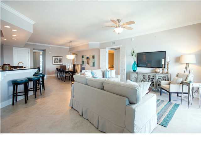 211 Durango Road, Unit 713 Destin, FL 32541 - Photo 5 of 30 a living room with furniture and a flat screen tv