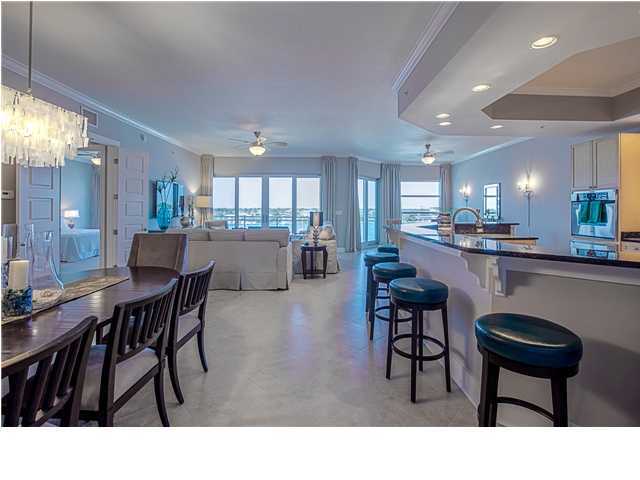 211 Durango Road, Unit 713 Destin, FL 32541 - Photo 6 of 30 a living room with stainless steel appliances kitchen island granite countertop furniture and a view of kitchen
