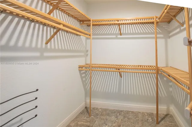 an aerial view of house with yard swimming pool and outdoor seating