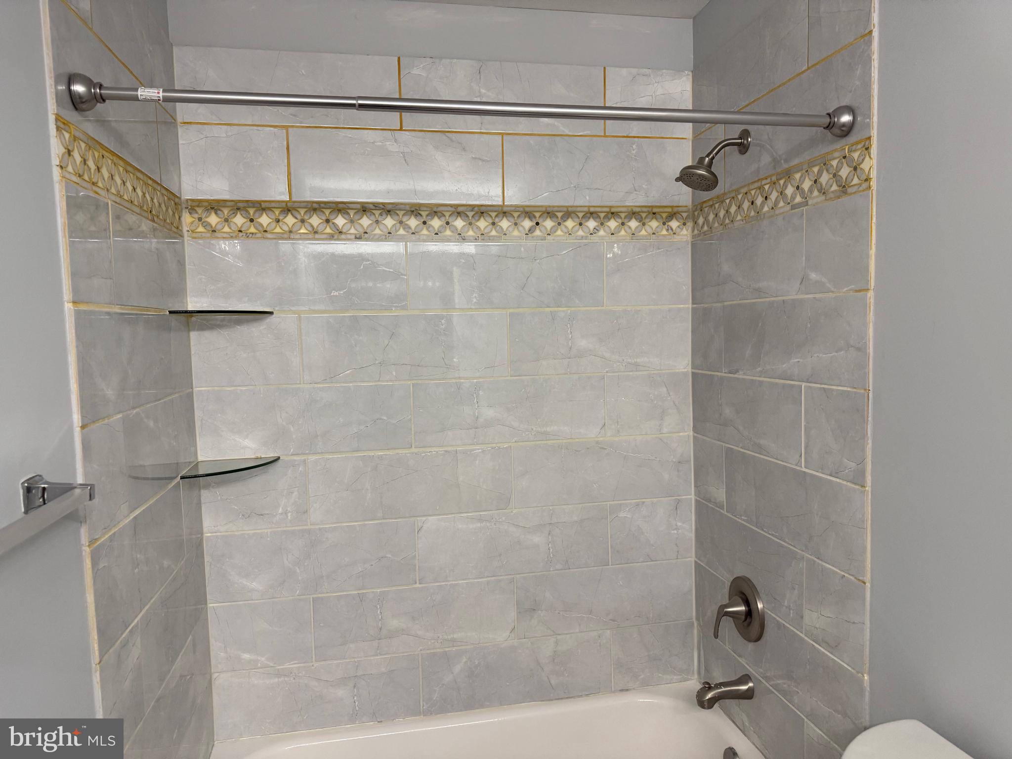 1935 Winslow Court Woodbridge, VA 22191 - Photo 14 of 34 a bathroom with a shower and a sink