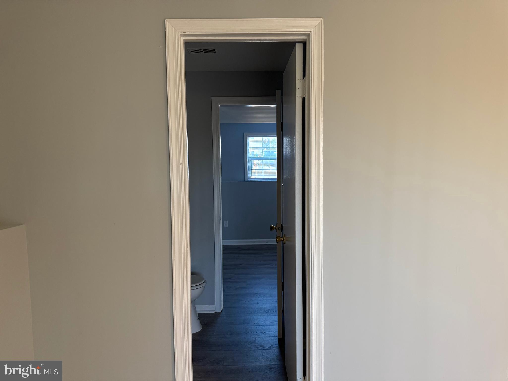 1935 Winslow Court Woodbridge, VA 22191 - Photo 17 of 34 a view of a hallway with wooden floor