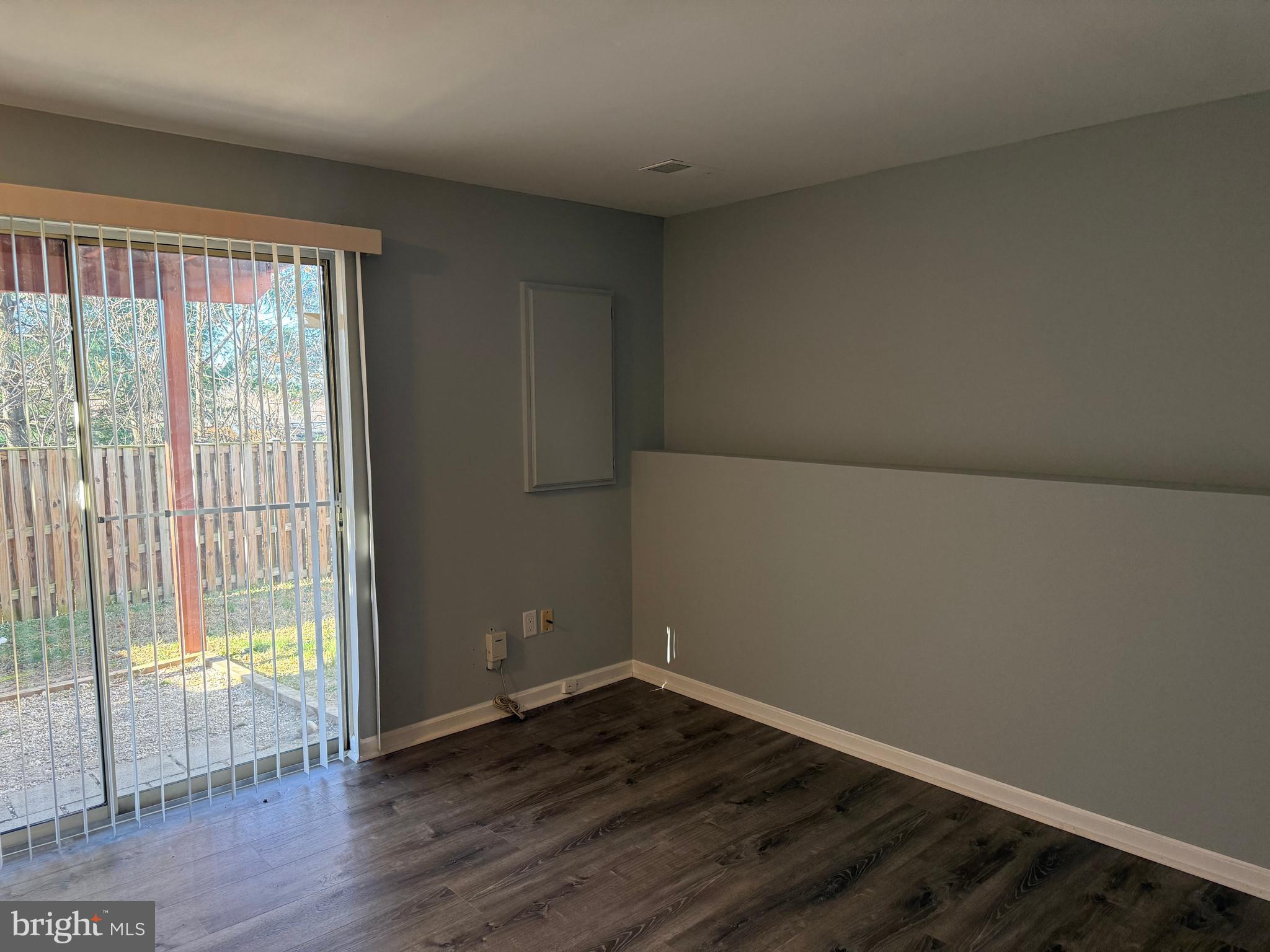 1935 Winslow Court Woodbridge, VA 22191 - Photo 23 of 34 an empty room with wooden floor and windows