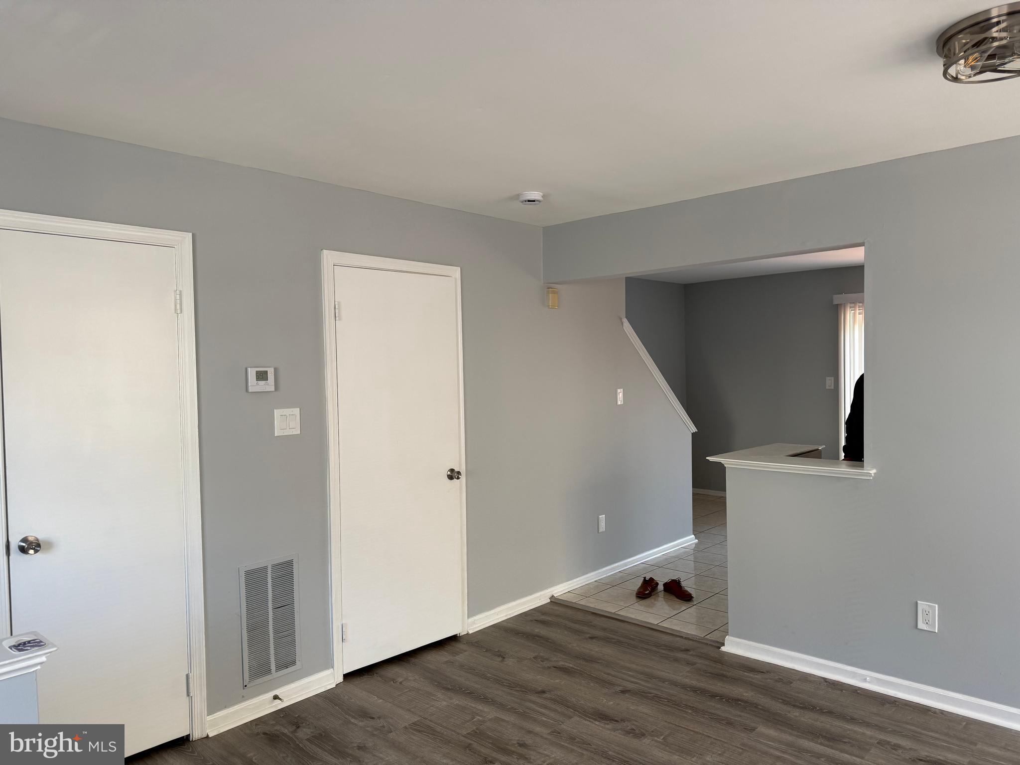 1935 Winslow Court Woodbridge, VA 22191 - Photo 27 of 34 a view of room with stairs and wooden floor
