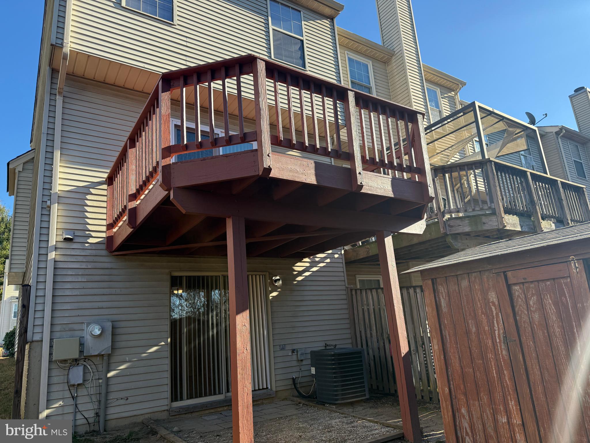 1935 Winslow Court Woodbridge, VA 22191 - Photo 31 of 34 a view of a house with a deck