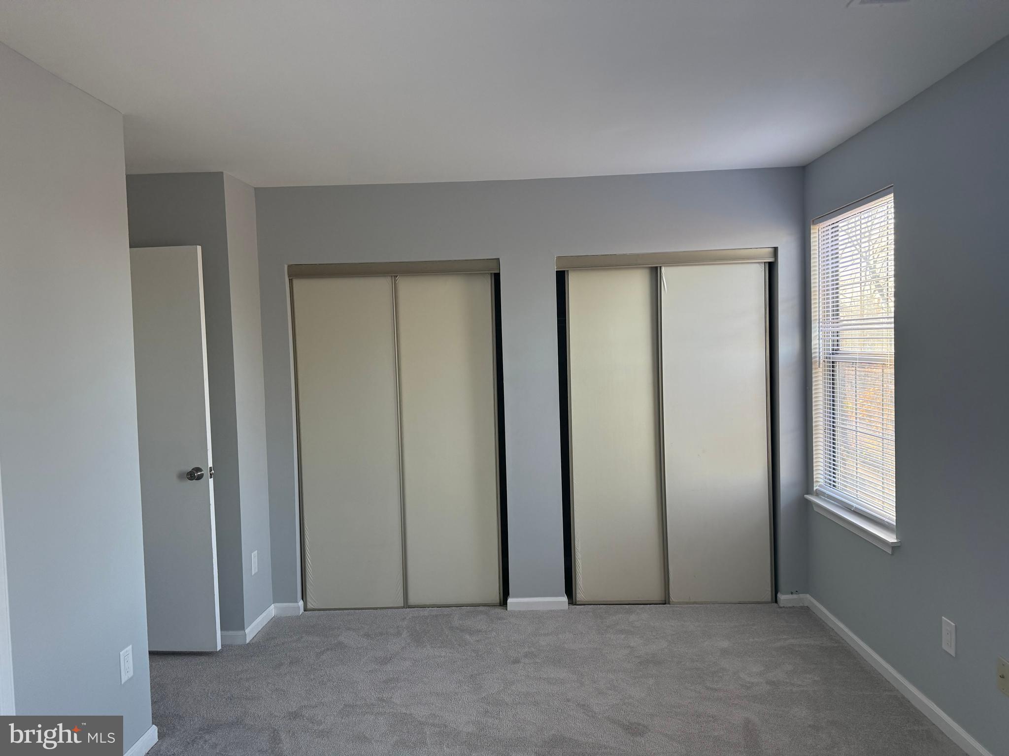 1935 Winslow Court Woodbridge, VA 22191 - Photo 9 of 34 an empty room with windows and closet