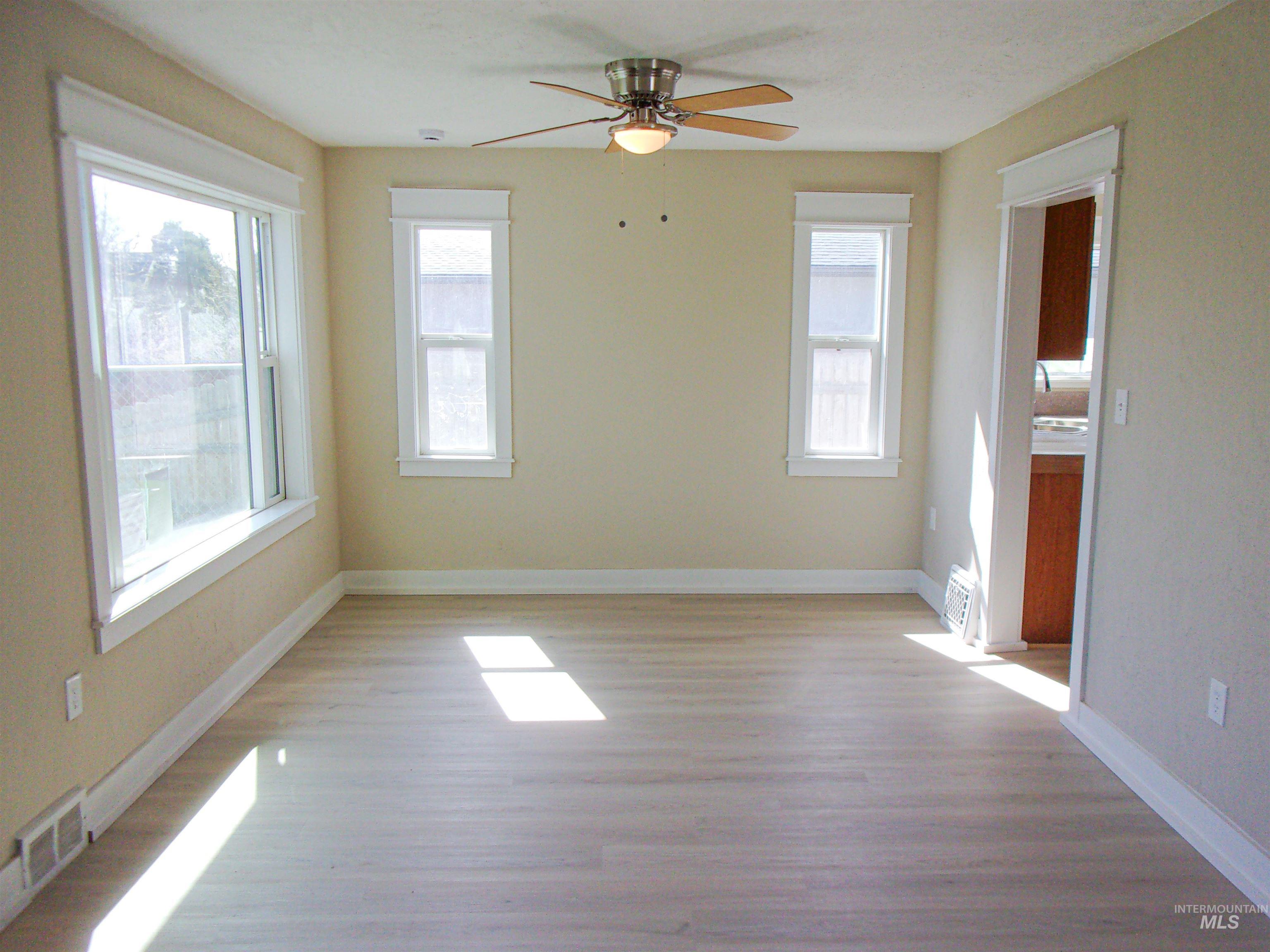605 North 6th Street Parma, ID 83660 - Photo 36 of 46 Empty room featuring light wood-type flooring and ceiling fan
