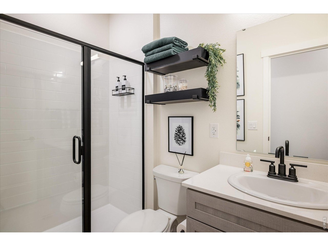 2121 Hummingbird Way, Unit 201 Georgetown, CO 80444 - Photo 13 of 37 a bathroom with a sink a toilet and shower