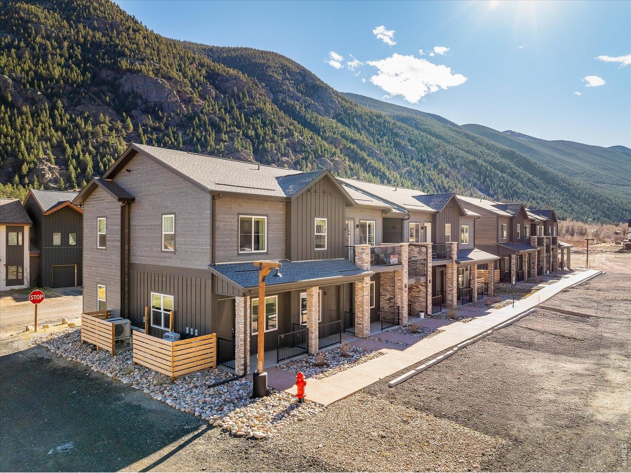 2121 Hummingbird Way, Unit 201 Georgetown, CO 80444 - Photo 18 of 37 a view of a house with a patio