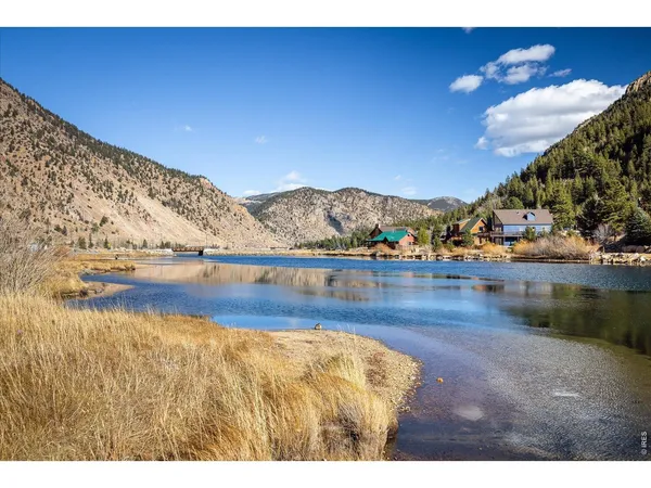 a view of a street with shops