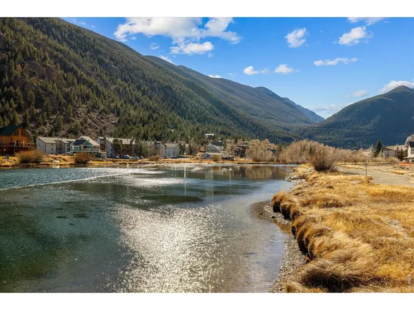 a view of a lake with outdoor space