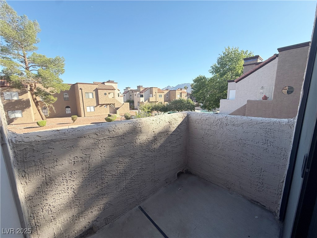2981 Juniper Hills Boulevard, Unit 204 Las Vegas, NV 89142 - Photo 16 of 17 Balcony featuring a residential view
