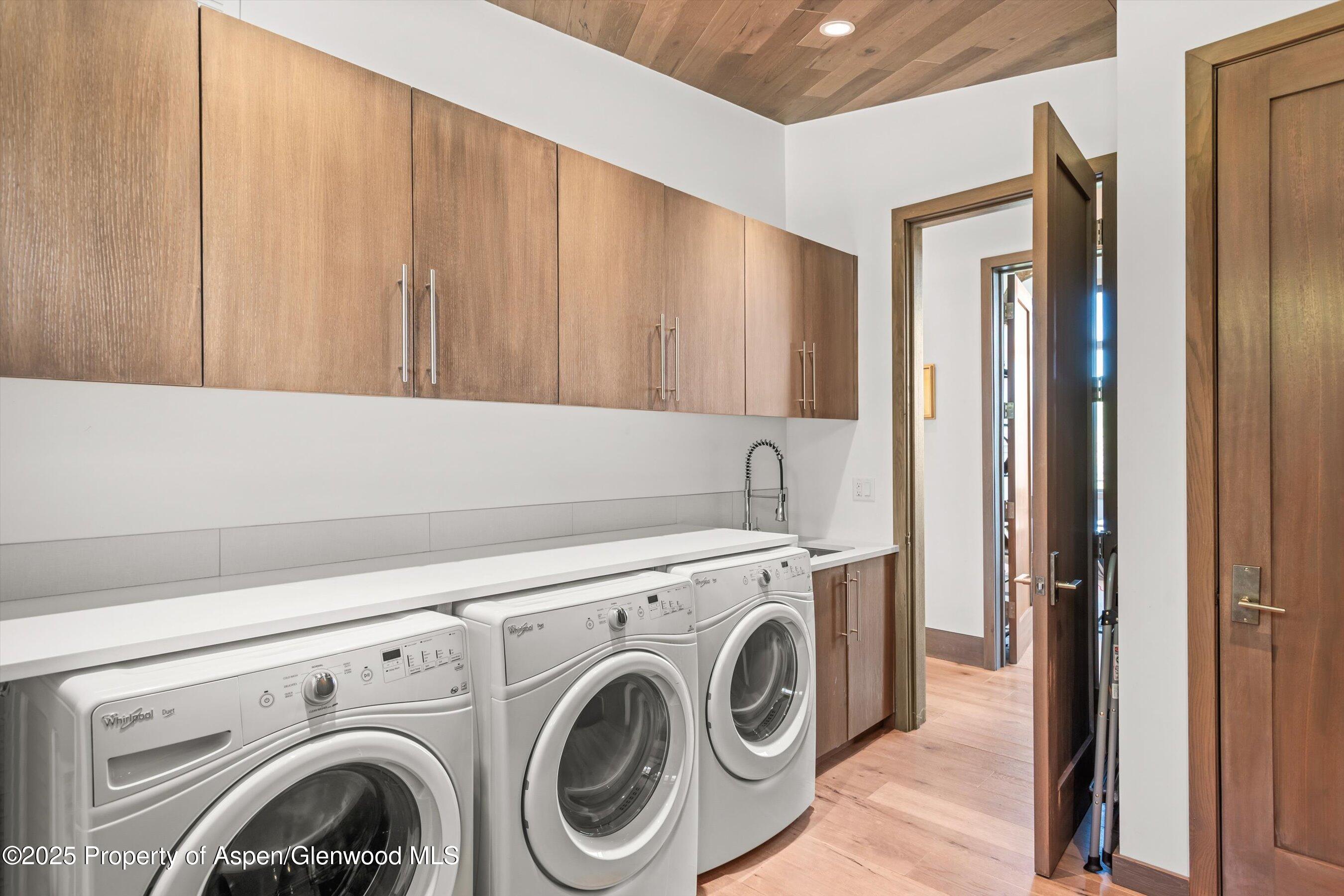 272 Oak Ridge Road Snowmass Village, CO 81615 - Photo 21 of 54 a utility room with dryer and washer
