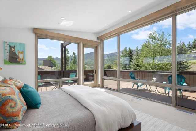 a bath tub sitting in front of a window