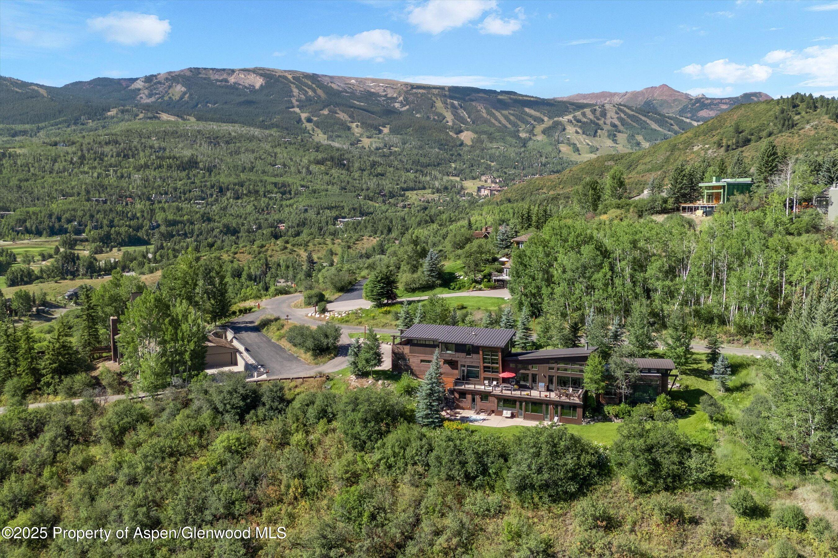272 Oak Ridge Road Snowmass Village, CO 81615 - Photo 51 of 54 an aerial view of a house with mountain view