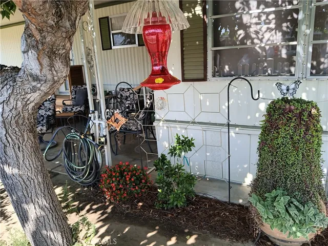 a front view of small house with outdoor space
