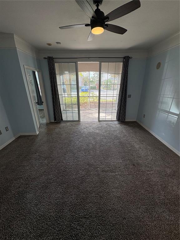 3280 Soho Street, Unit 104 Orlando, FL 32835 - Photo 12 of 23 a view of an empty room with a window