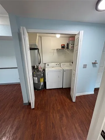 a view of a storage & utility room with wooden floor