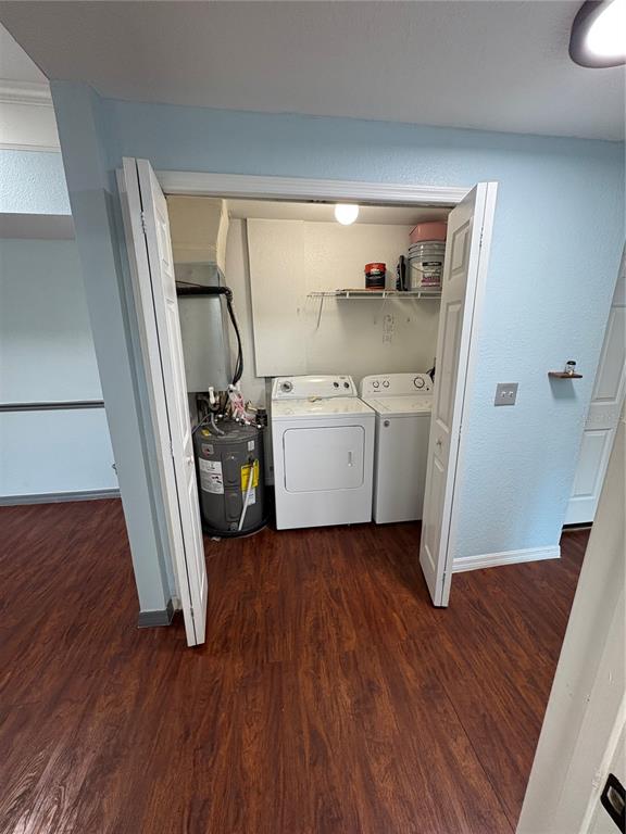 3280 Soho Street, Unit 104 Orlando, FL 32835 - Photo 5 of 23 a view of a storage & utility room with wooden floor