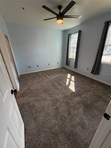 a view of an empty room and window