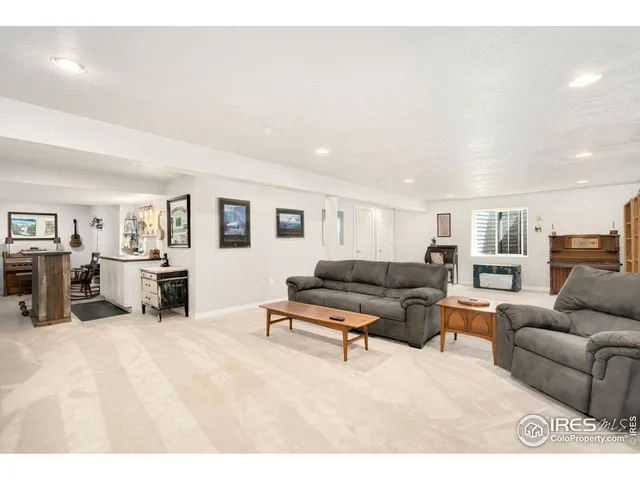 a living room with furniture and a couch