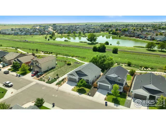 an aerial view of a house with a garden