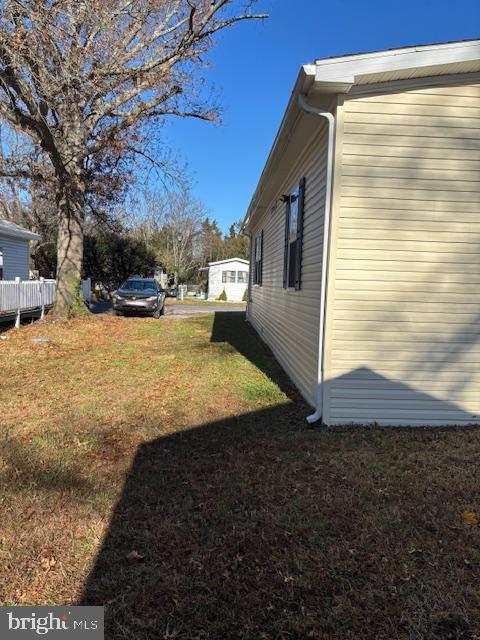31706 Janice Road Lewes, DE 19958 - Photo 17 of 20 a view of a backyard of the house