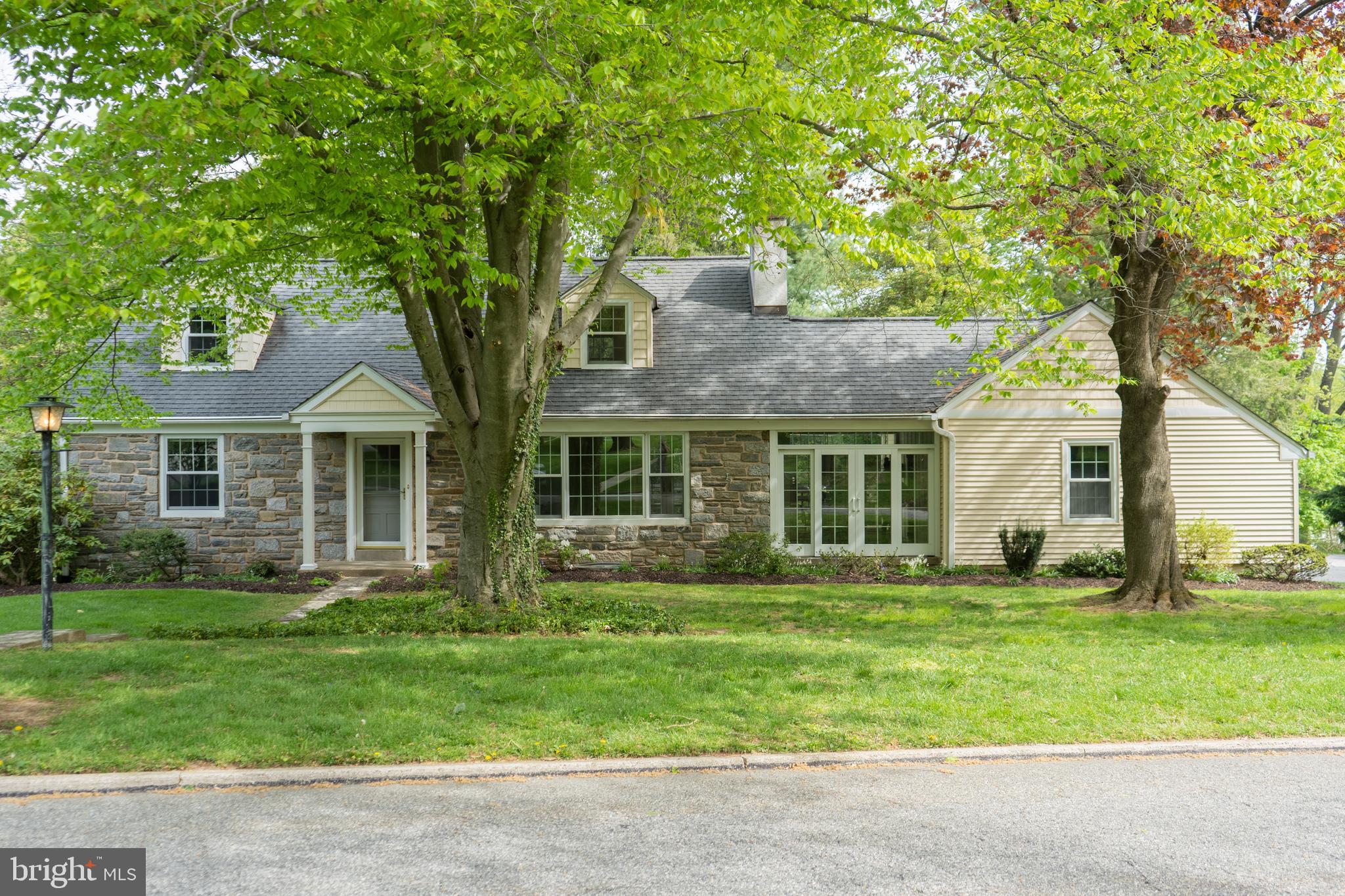 149 Clover Hill Lane Wayne, PA 19087 - Photo 3 of 50 front view of a house with a yard