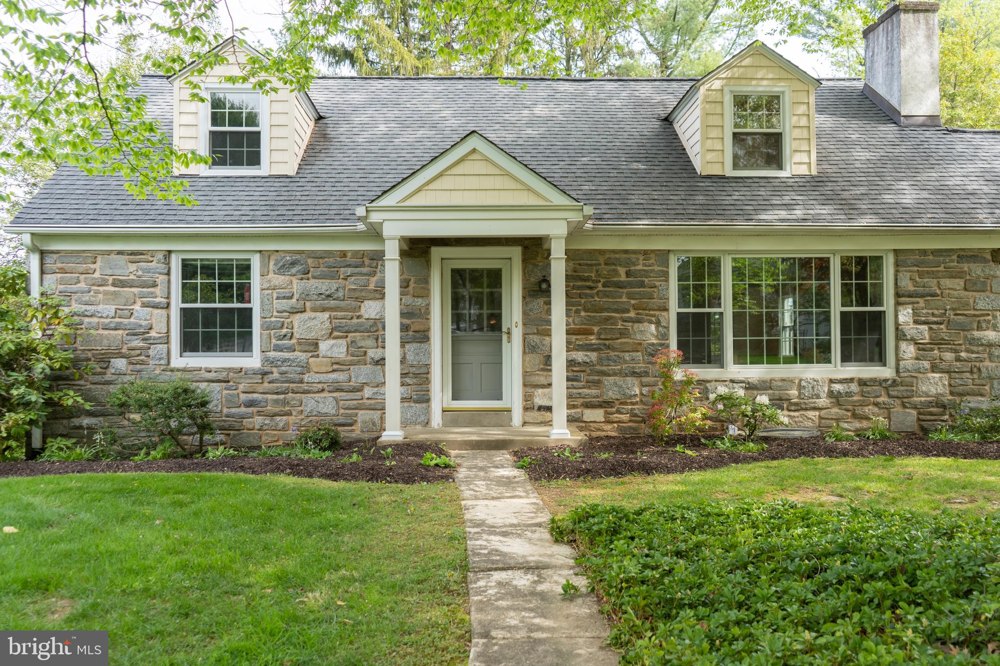 149 Clover Hill Lane Wayne, PA 19087 - Photo 4 of 50 a front view of a house with a yard