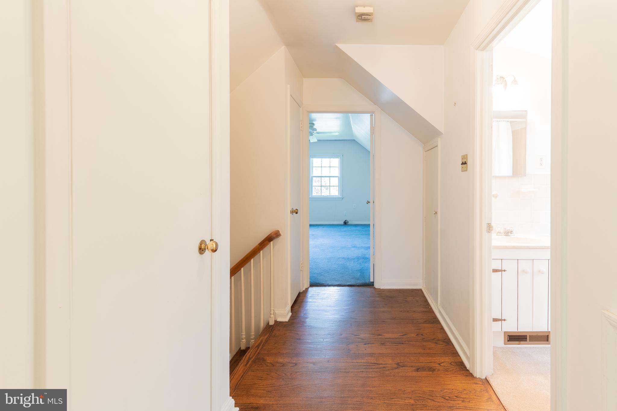 149 Clover Hill Lane Wayne, PA 19087 - Photo 34 of 50 a view of a hallway with wooden floor