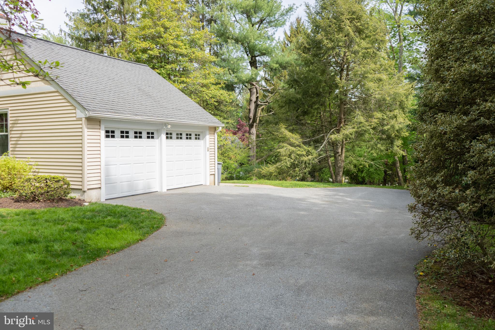149 Clover Hill Lane Wayne, PA 19087 - Photo 6 of 50 a view of a house with a backyard