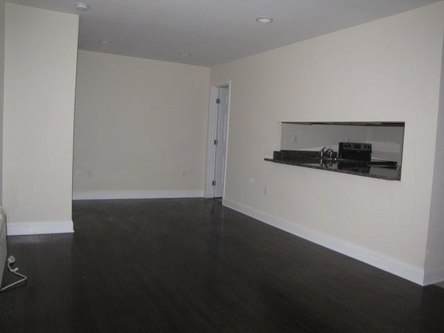 805 Piedmont Avenue Northeast, Unit 4 Atlanta, GA 30308 - Photo 2 of 9 wooden floor in an empty room