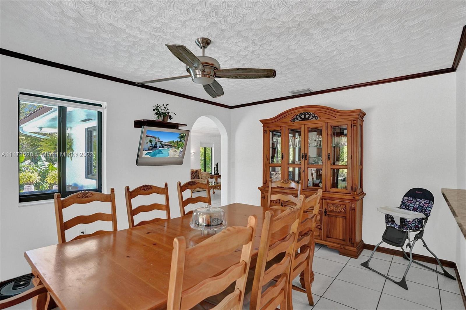 10801 Griffing Boulevard Biscayne Park, FL 33161 - Photo 51 of 77 a living room with furniture