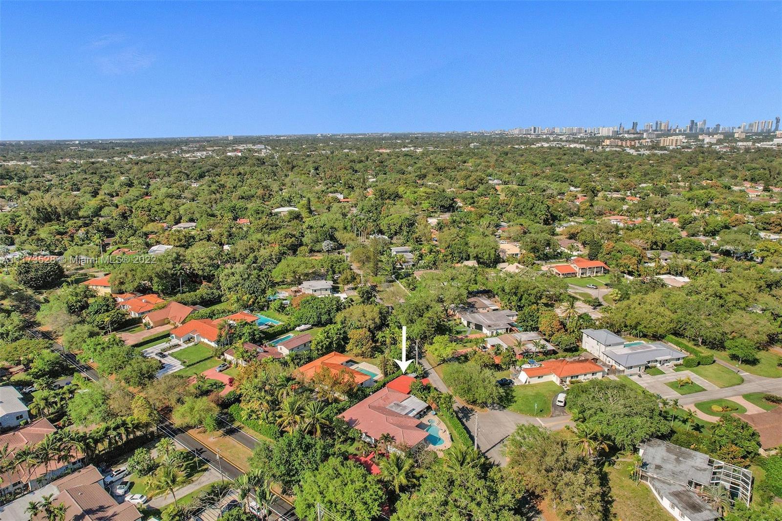 10801 Griffing Boulevard Biscayne Park, FL 33161 - Photo 6 of 77 an aerial view of residential houses with city view