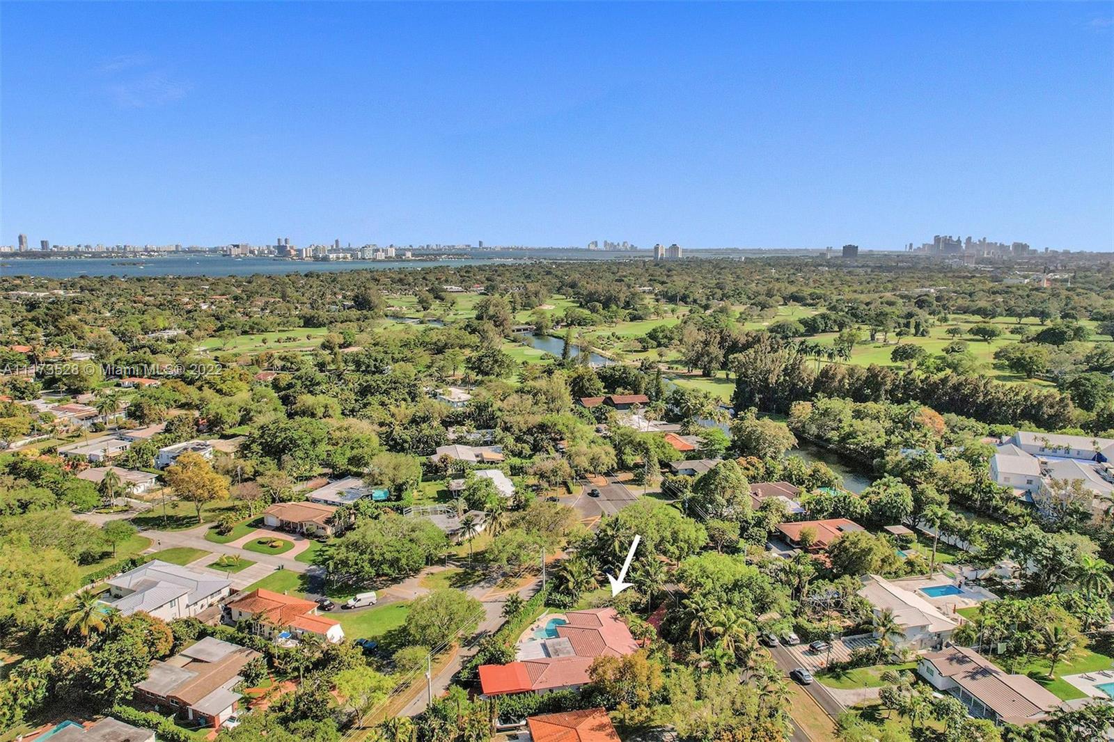 10801 Griffing Boulevard Biscayne Park, FL 33161 - Photo 9 of 77 a view of a city with mountains in the background