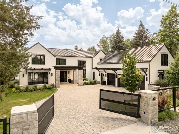 a view of house with outdoor space and sitting area